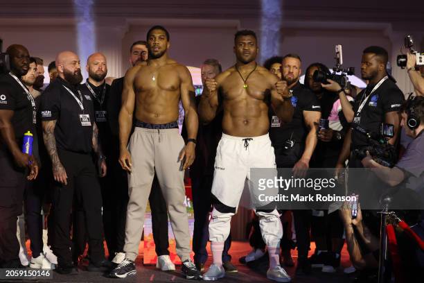 Anthony Joshua and Francis Ngannou go head to head at the weigh-in ahead of their fight on March 7, 2024 in Riyadh, Saudi Arabia.