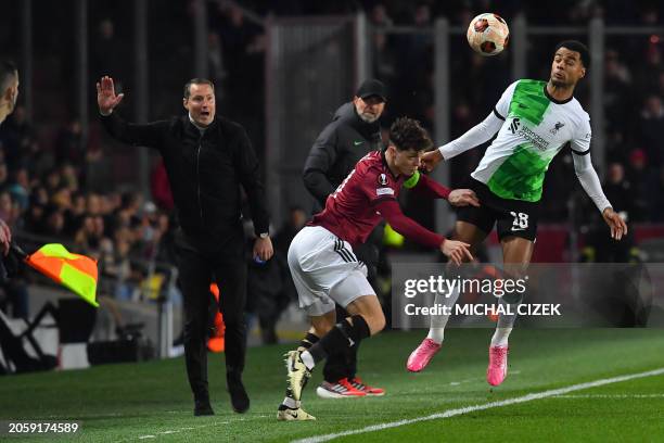 Liverpool's German manager Juergen Klopp and Sparta Praha's Danish coach Brian Priske react as Liverpool's Dutch striker Cody Gakpo and Sparta...