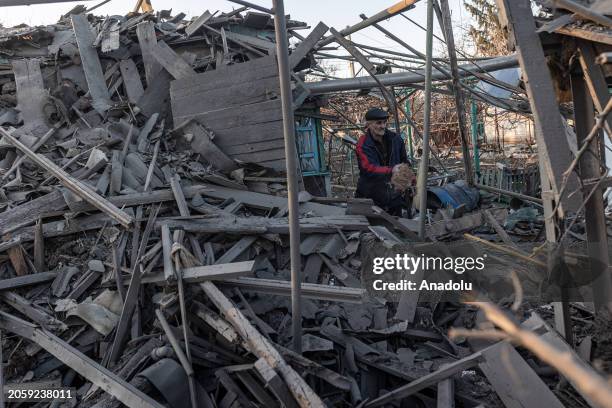 Resident clears debris from his house , destoyed due to Russian shelling as Russia-Ukraine war continues in Kostiantynivka, Ukraine on March 07, 2024.