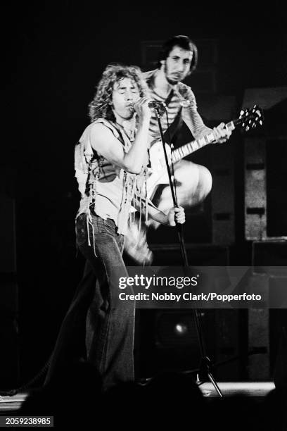 English lead singer Roger Daltrey and guitarist Pete Townshend of rock group The Who performing live on stage during The Who By Numbers tour at the...