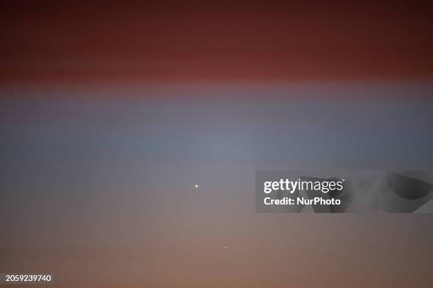 Venus and Mars planets in conjunction before sunrise are seen from L'Aquila, Italy, on February 22nd, 2024. Venus, the brilliant &quot;Morning...