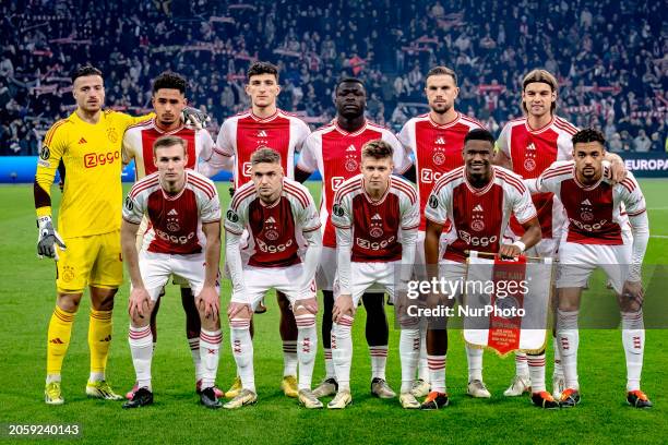 Ajax goalkeeper Diant Ramaj, along with players Devyne Rensch, Jorrel Hato, Jordan Henderson, Kenneth Taylor, Brian Brobbey, Ahmetcan Kaplan, Sivert...