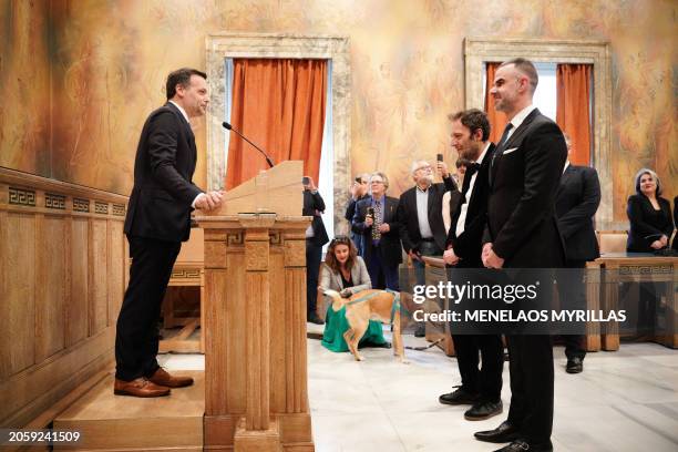 The mayor of Athens Haris Doukas proclaims the first same sex couple to be married at Athens City Hall on Mar. 7, 2024. Greek novelist Petros...