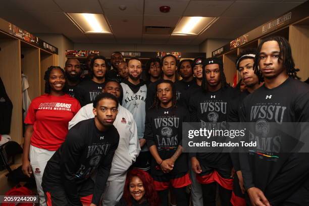 Steph Curry of the Western Conference meets the players of Winston Salem State University during the NBA HBCU Classic Presented by AT&T as part of...