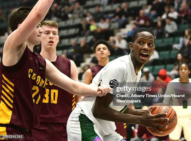 Green Tech's Justin Owens drives to the basket during a Class AA semifinal game against Colonie at the Cool Insuring Arena on Tuesday, March 3, 2020...