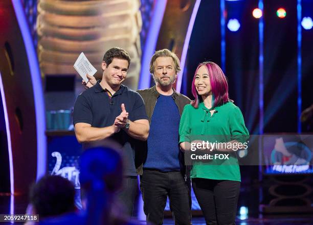 Celebrity Advisor Adam Devine, Host David Spade and Contestant Emi in the SNAKE OIL season finale episode "Rucker &amp; Devine" airing Wednesday,...