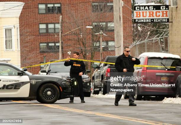 Police close off Albany Street between Hulett and Craig Streets for reports of a shooting on Tuesday, March 24, 2020 in Schenectady, N.Y. The police...