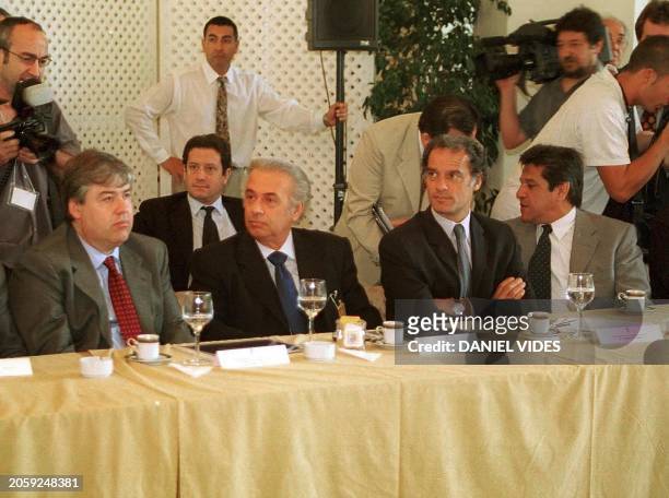 The leader of the government, Anibal Ibarra next to the presidential precandidate, Jose Manuel de La Sota participate in a meeting held at the...