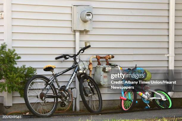 Bicycles are seen outside a townhouse where a woman and state trooper were seen leaving during an investigation at Tallow Wood Drive where Gustavo...