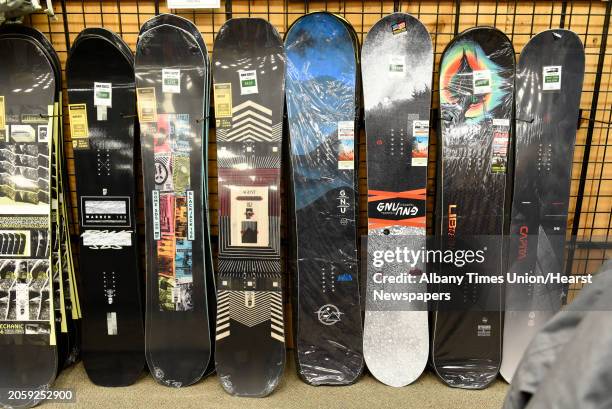 Snowboards are seen on display at Alpin Haus on Wednesday, Nov. 11, 2020 in Clifton Park, N.Y. There won't be a ski show in Albany this year.