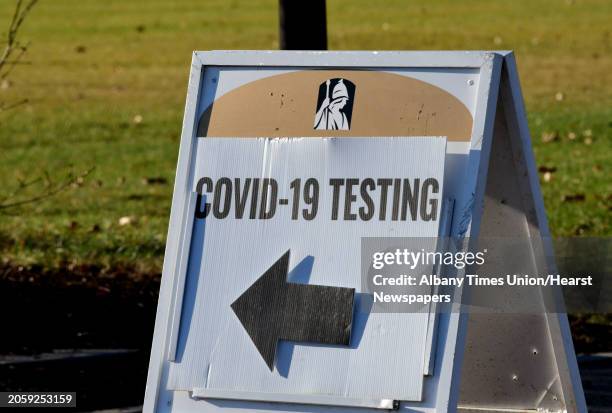 Sign directs traffic for the drive-through COVID-19 testing site at University at Albany on Thursday, Dec. 3, 2020 in Albany, N.Y.