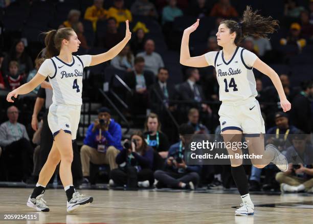 Shay Ciezki and Kylie Lavelle of the Penn State Nittany Lions celebrate Lavelle's score against the Wisconsin Badgers in the Second Round of the Big...