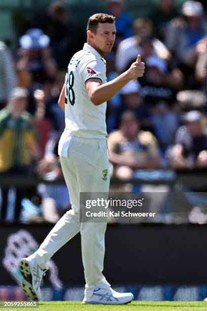 Josh Hazlewood of Australia celebrates after dismissing Daryl Mitchell of New Zealand during day one of the Second Test in the series between New...