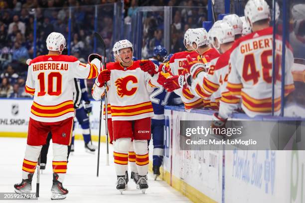 Yegor Sharangovich of the Calgary Flames celebrates a goal against the Tampa Bay Lightning during the first period at Amalie Arena on March 7, 2024...