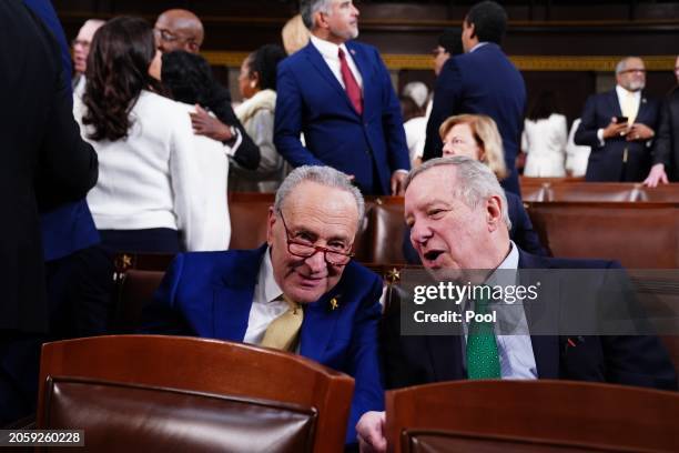 Senate Majority Leader Chuck Schumer chats with Sen. Dick Durbin on the House floor ahead of the annual State of the Union address by U.S. President...