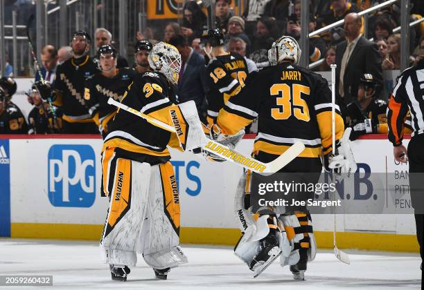 Tristan Jarry of the Pittsburgh Penguins is replaced by Alex Nedeljkovic of the Pittsburgh Penguins in the second period against the Washington...