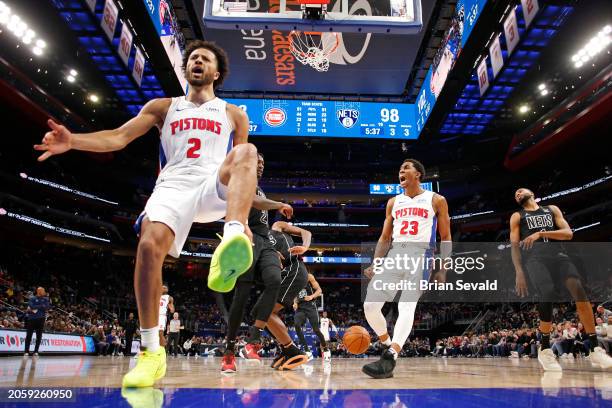 Cade Cunningham and Jaden Ivey of the Detroit Pistons celebrate dunk during the game against the Brooklyn Nets on March 7, 2024 at Little Caesars...