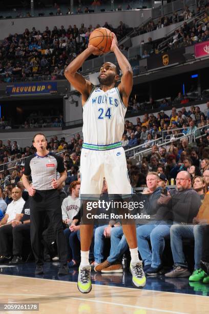 Warren of the Minnesota Timberwolves shoots a three point basket during the game against the Indiana Pacers on March 7, 2024 at Gainbridge Fieldhouse...