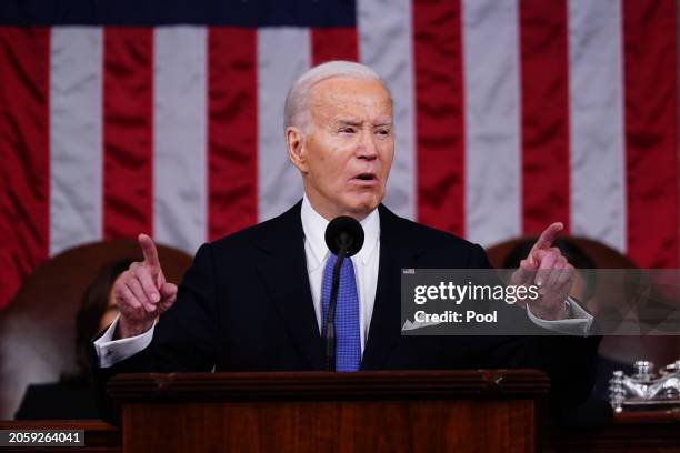 President Joe Biden delivers the annual State of the Union address before a joint session of Congress in the House chamber at the Capital building on...
