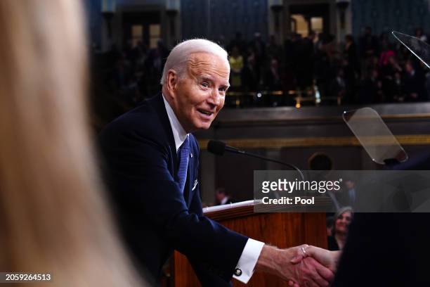 President Joe Biden departs after delivering the annual State of the Union address before a joint session of Congress in the House chamber at the...