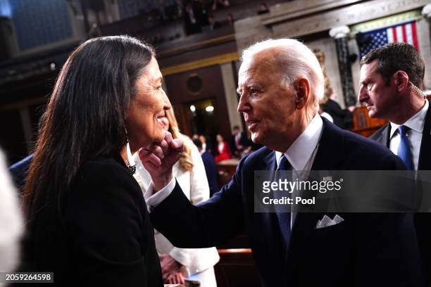 President Joe Biden gestures to Secretary of the Interior Debra Haaland after delivering his annual State of the Union address before a joint session...