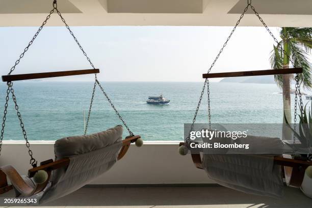 An inter-island ferry from Cheung Chau to the Sea Ranch residential development, built by Hutchison Whampoa Ltd., on Lantau Island in Hong Kong,...