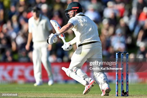 Travis Head of Australia makes a run during day one of the Second Test in the series between New Zealand and Australia at Hagley Oval on March 8,...