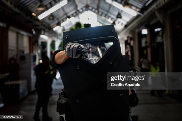 Team performs maneuvers to resolve an active shooter situation at the mall as 500 emergency service personnel and 40 crisis actors take part in a...