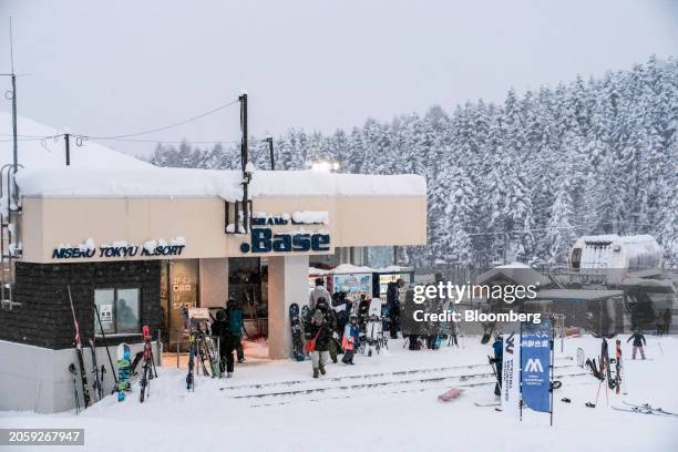 Skiers at the Niseko Tokyu Grand Hirafu in Kutchan, Hokkaido Prefecture, Japan, on Tuesday, Dec. 23, 2023. Niseko's famed powder snow has helped...