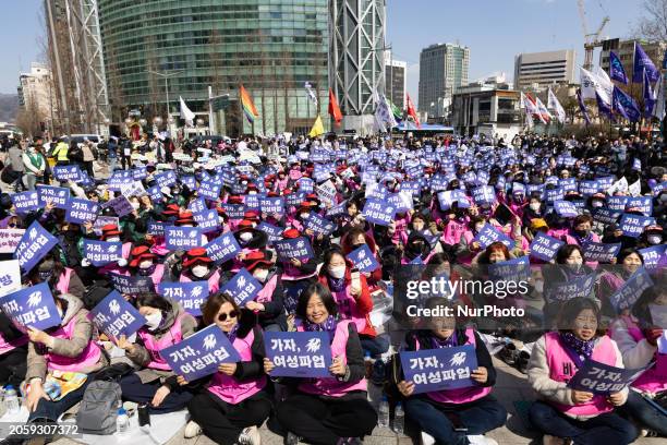 Hundreds of female workers are attending the rally for the International Women's Day strike, chanting slogans at the 2024 Women's Strike Organizing...
