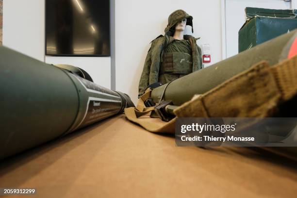 Remains of rocket launcher and a Russian soldier are presented for the publicduring an exhibition "Evidence of Crimes" in 'Gare Europe', in front of...