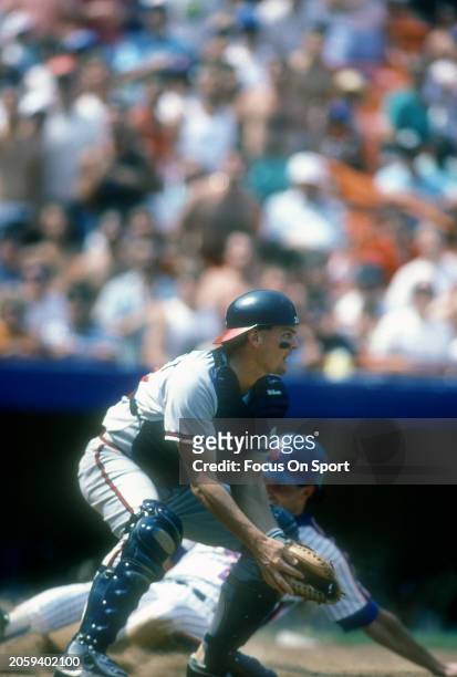 Bruce Benedict of the Atlanta Braves in action against the New York Mets during Major League Baseball game circa 1985 at Shea Stadium in the Queens...