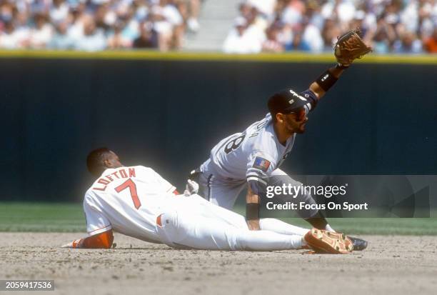 Joey Cora of the Chicago White Sox tags out Kenny Lofton of the Cleveland Indians during a Major League Baseball game circa 1994 at Jacobs Field in...