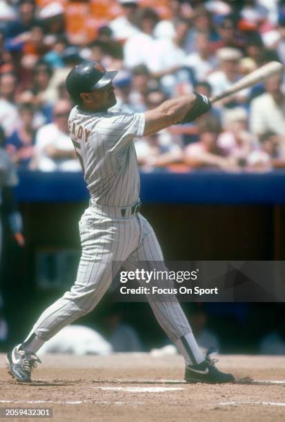 Randy Ready of the San Diego Padres bats against the New York Mets during a Major League Baseball game circa 1987 at Shea Stadium in the Queens...