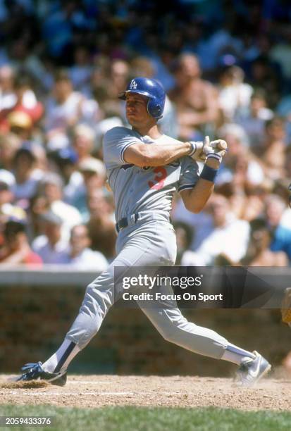 Steve Sax of the Los Angeles Dodgers bats against the Chicago Cubs during a Major League Baseball game circa 1987 at Wrigley Field in Chicago,...