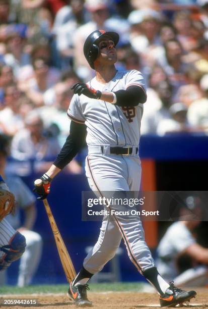 Will Clark of the San Francisco Giants bats against the New York Mets during a Major League Baseball game circa 1987 at Shea Stadium in the Queens...