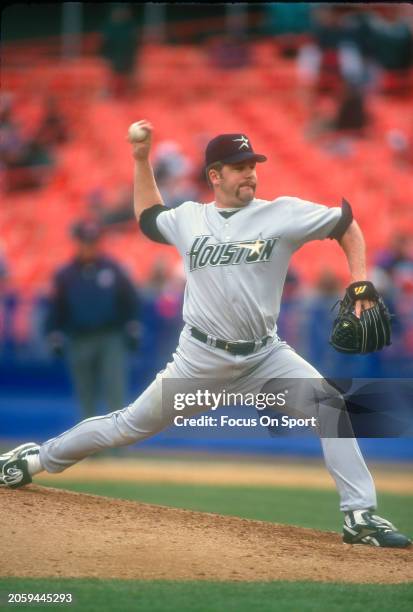 Todd Jones of the Houston Astros pitches against the New York Mets during a Major League Baseball game circa 1996 at Shea Stadium in the Queens...