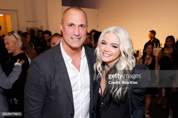 Nigel Barker and Hayes Warner attend the CARE International Women's Day: She Leads the World Portrait Gallery at Spring Studios on March 04, 2024 in...