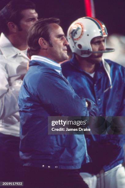 Miami Dolphins coach Don Shula watches his team from the sideline during a regular season game against the Baltimore Colts on December 11, 1971 at...