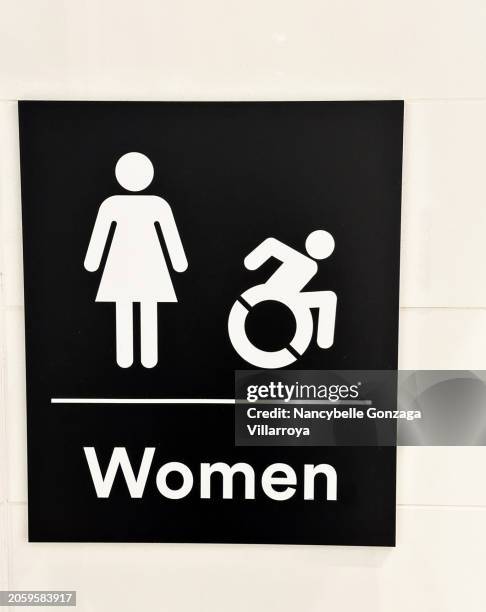 black and white female figure and disability  sign - bathroom icon stock pictures, royalty-free photos & images