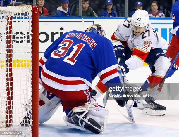 Igor Shesterkin of the New York Rangers makes the third period save on Eetu Luostarinen of the Florida Panthers at Madison Square Garden on March 04,...