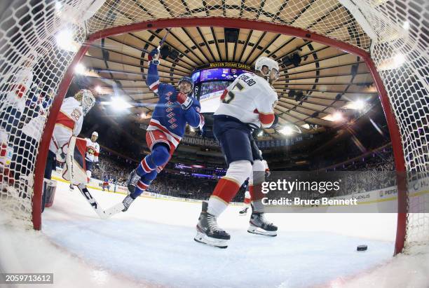 Jimmy Vesey of the New York Rangers celebrates a first period goal by Will Cuylle against Sergei Bobrovsky of the Florida Panthers at Madison Square...