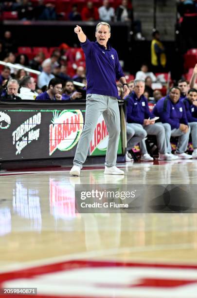 Head coach Chris Collins of the Northwestern Wildcats watches the game against the Maryland Terrapins at Xfinity Center on February 28, 2024 in...