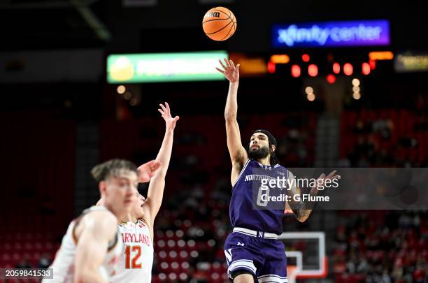 Boo Buie of the Northwestern Wildcats shoots the ball against the Maryland Terrapins at Xfinity Center on February 28, 2024 in College Park, Maryland.