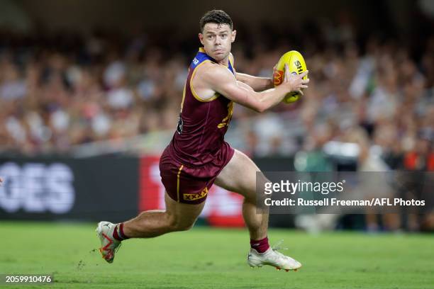 Lachie Neale of the Lions in action during the 2024 AFL Opening Round match between the Brisbane Lions and the Carlton Blues at The Gabba on March...