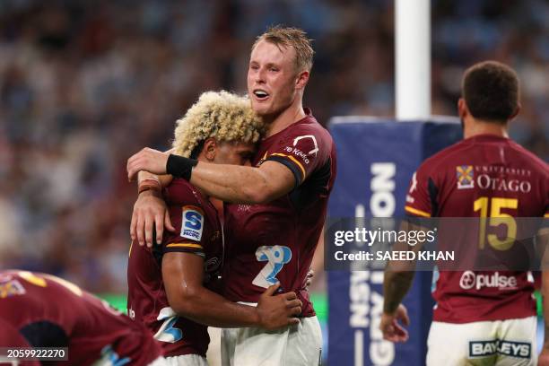 Highlanders' Sam Gilbert and Folau Fakatava celebrate their victory against in the Super Rugby match between the NSW Waratahs and the Highlanders in...