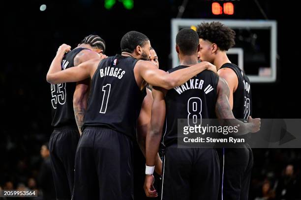 Mikal Bridges of the Brooklyn Nets speaks to his team in the huddle against the Atlanta Hawks during the game at Barclays Center on February 29, 2024...