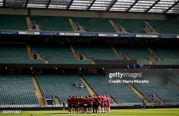 London , United Kingdom - 8 March 2024; England players huddle during an England rugby captain's run at Twickenham Stadium in London, England.