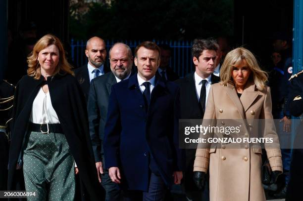 French President Emmanuel Macron , his wife Brigitte Macron , National assembly president Yael Braun-Pivet , Justice Minister Eric Dupond-Moretti and...