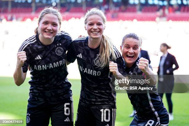 Jonna van de Velde of AFC Ajax, Nadine Noordam of AFC Ajax and Sherida Spitse of AFC Ajax celebrate their team's win after the Dutch Azerion Women's...